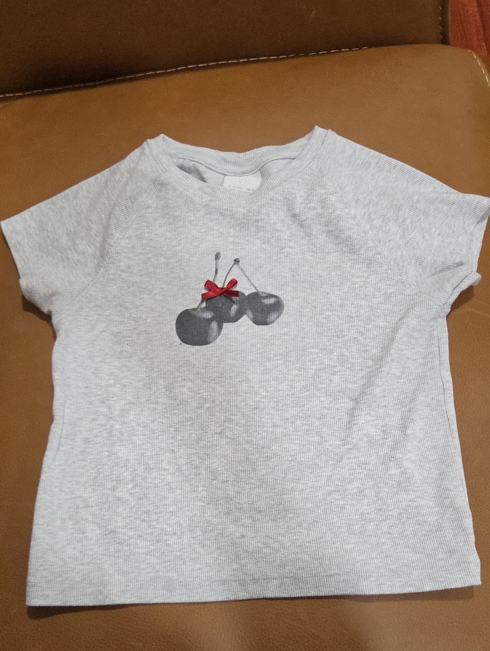 Zara Light Gray Short-Sleeve Tee with Cherry Motif and Red Bow